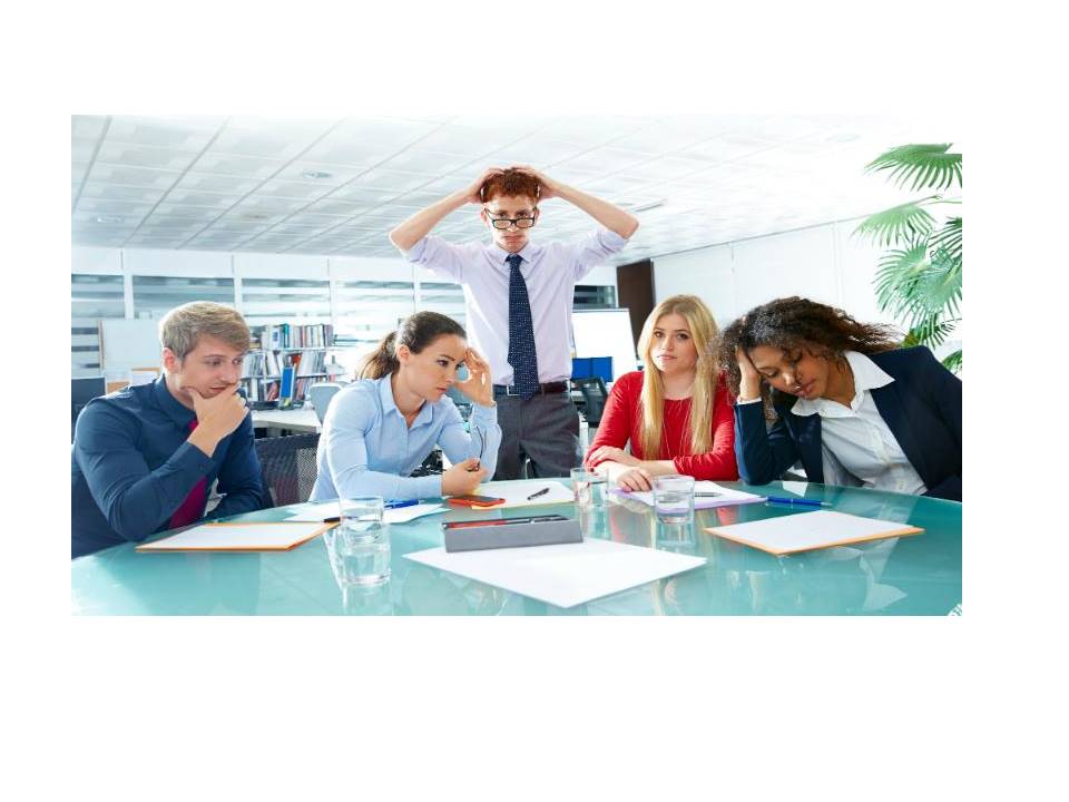 Office team looking stressed during a meeting.